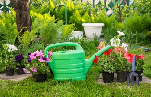 Lawn mowing visit for a Woolwich property with access and parking considerations